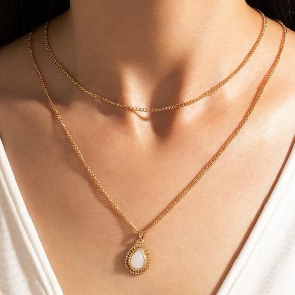 Urban Outfitters Jewelry - raindrop gold pendant layered necklace